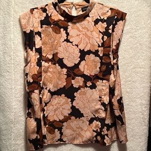 Lightly used black and peach or tan flowers